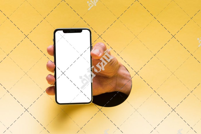 عکس مکاپ موبایل در دست مرد در پس زمینه زرد